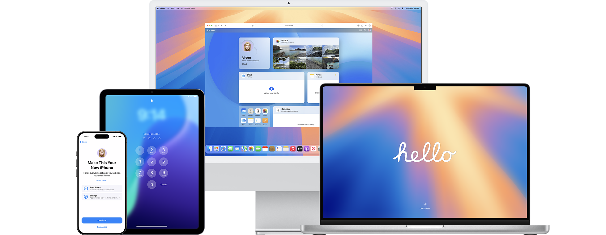 Apple devices. There is an Apple laptop, an iMac, an iPhone and an iPad.
