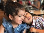 a picture of 2 children, which was taken on an iPhone by Vic Gundotra, who used to be a Vice President at Google.